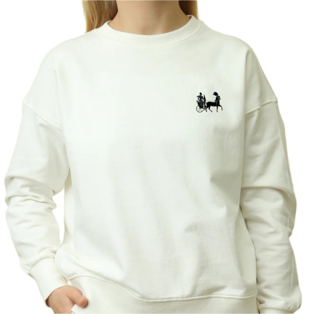 White sweatshirt with a black graphic on a beige background